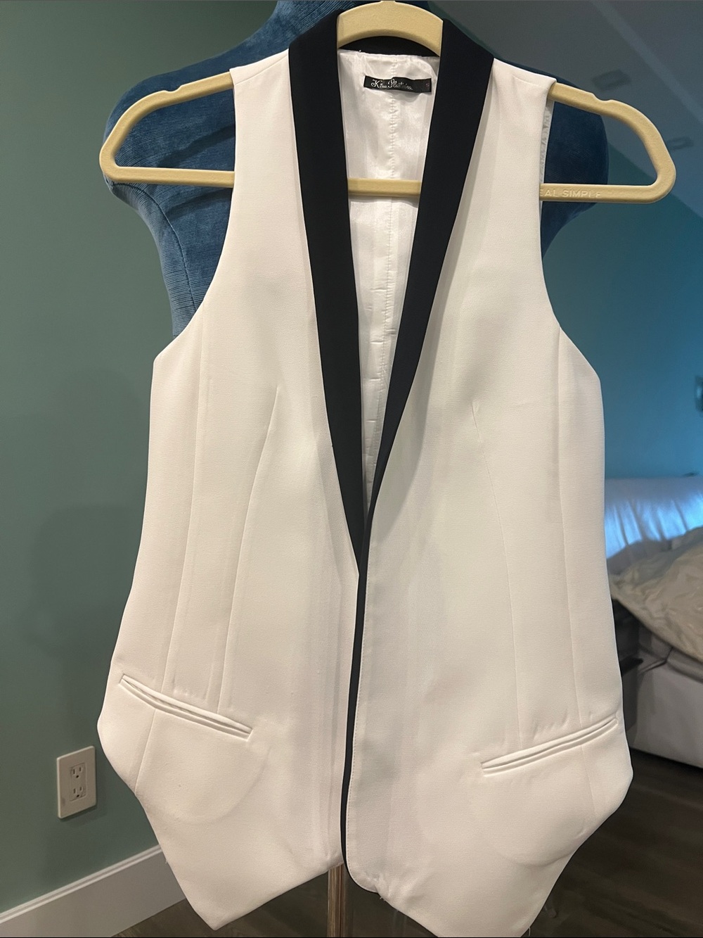 White Sleeveless Tuxedo Vest with Black Trim fromRussianDesigner Kira Plastinina